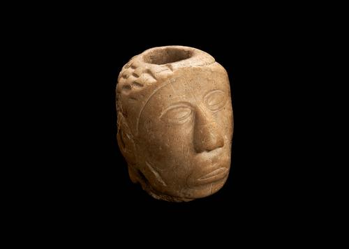 Human face effigy pipe