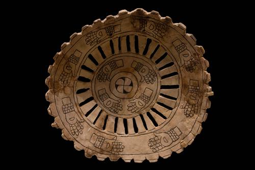 Engraved shell gorget with human hands