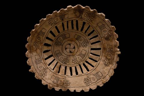 Engraved shell gorget with human hands