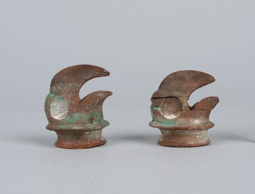 Raptor effigy earspools