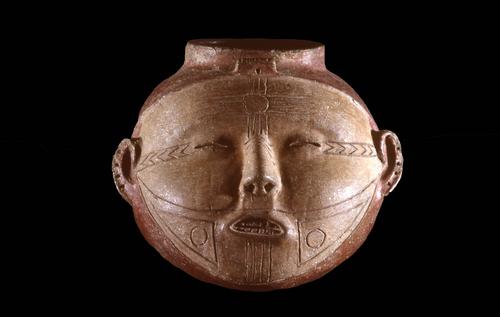 Human head effigy vessel with facial tattoos