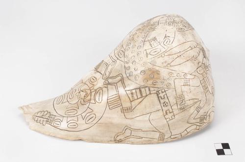 Engraved shell cup with two supernatural figures with snake extremities dancing above a coiled snake