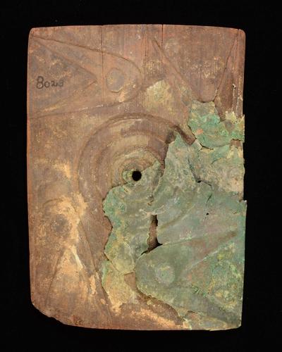 Wooden plate with copper overlay