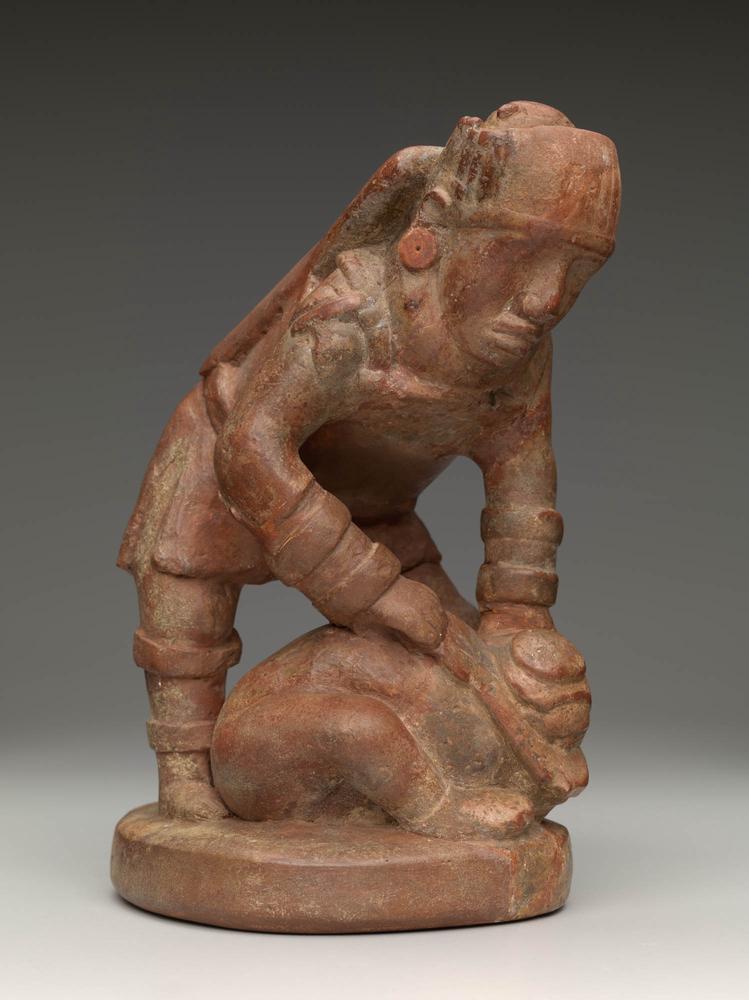 Conquering warrior effigy pipe