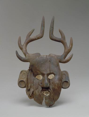 Human face effigy with deer antlers