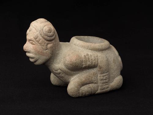 Kneeling figure effigy pipe